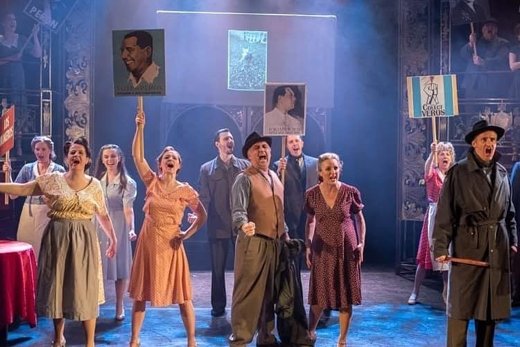 Evita — ensemble rally scene