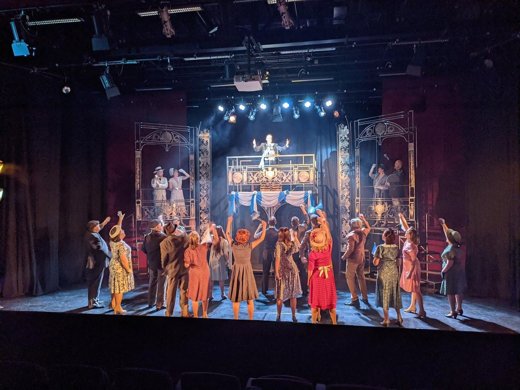 Evita — company on stage