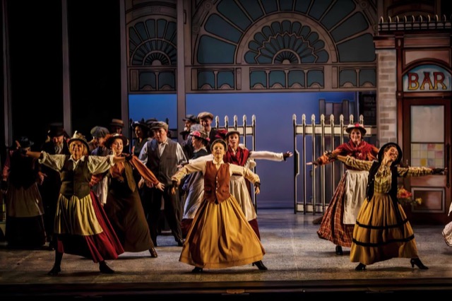 My Fair Lady — ensemble dancing outside the bar