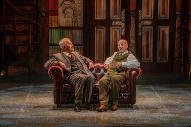 My Fair Lady — two performers seated in the study